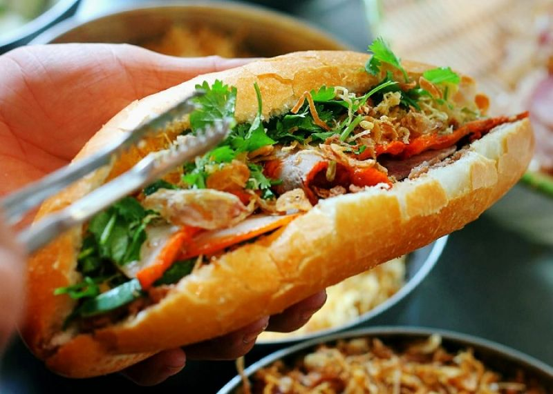 Vietnamese banh mi sandwich stuffed with pate and herbs