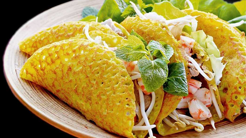 Crispy Vietnamese banh xeo pancake with shrimp and pork