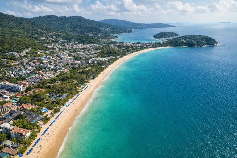 Where to stay in Phuket showing coastline with beach and town areas