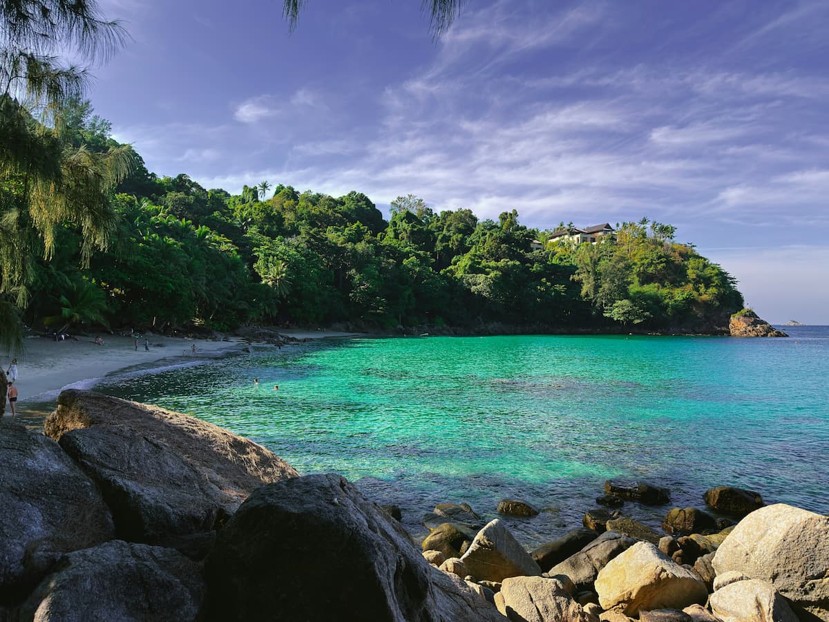 Best beaches in Phuket showing a quiet hidden beach with clear water
