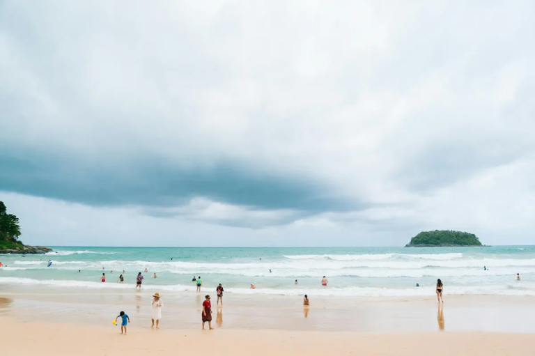 Best beaches in Phuket showing people enjoying a natural beach scene