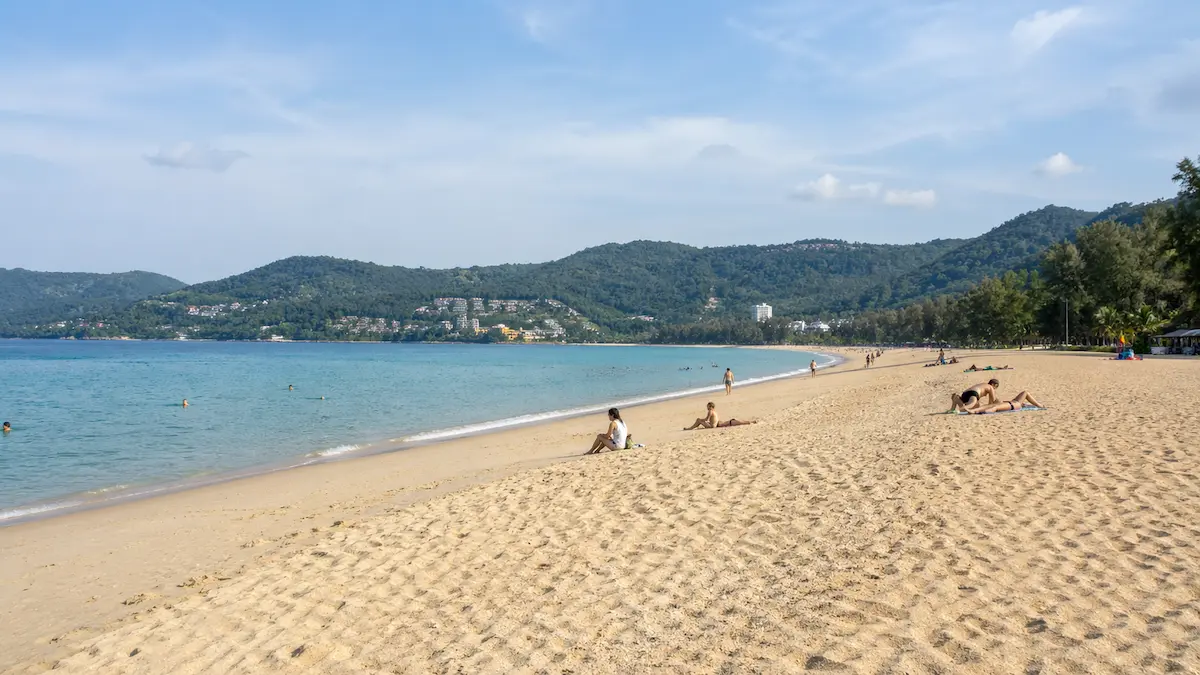 Karon beach Phuket showing wide open space and fewer crowds compared to Patong and Kata