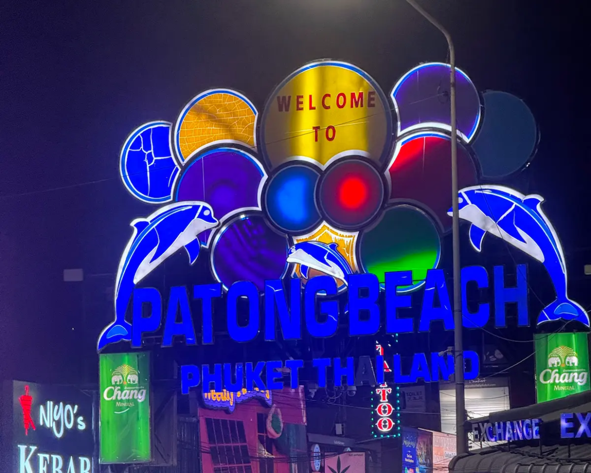 Patong Beach sign at night showing entrance to nightlife area in Phuket Thailand