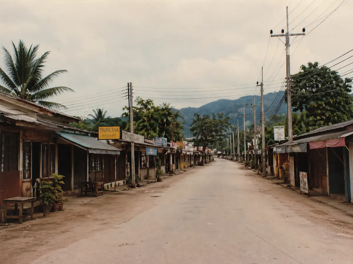 Illustrative example of Patong street in the 1980s showing quiet shops and minimal development in Phuket