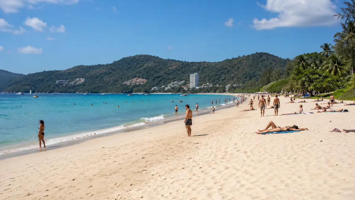 Sunny Phuket beach during dry season showing ideal weather and popular travel season conditions