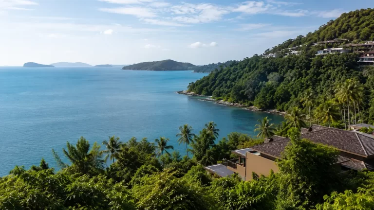 Elevated coastal view of Cape Panwa Phuket with tropical hillsides and calm southeast Phuket sea