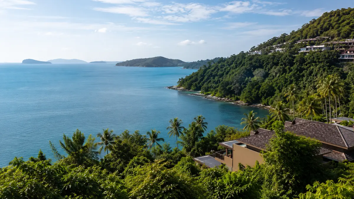 Elevated coastal view of Cape Panwa Phuket with tropical hillsides and calm southeast Phuket sea