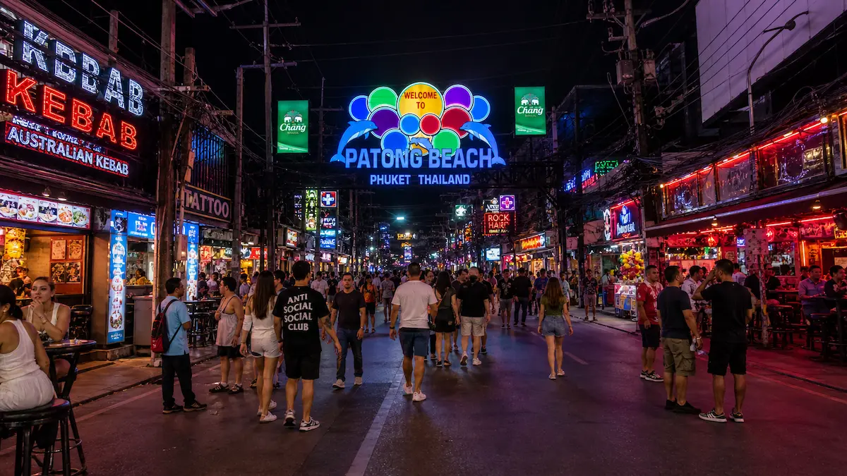 Bangla Road Patong Phuket at night with tourists and neon lights showing busy nightlife environment