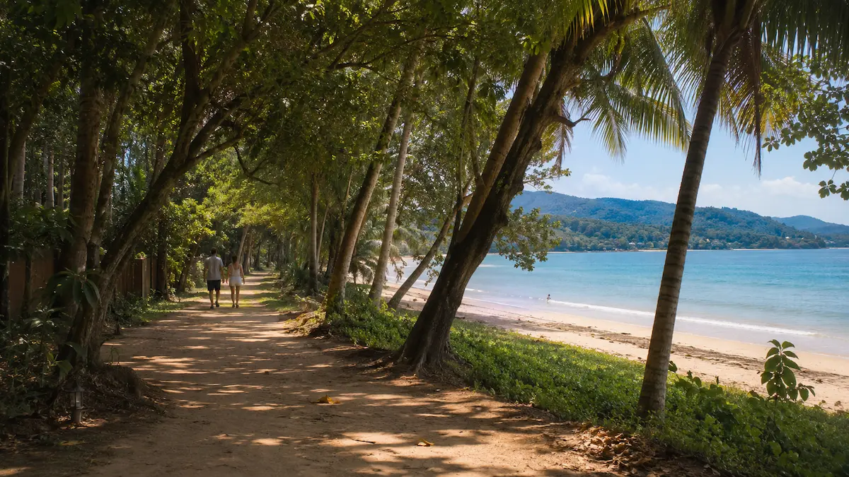 Shaded beach path and tropical coastline near Layan Beach in northwest Phuket