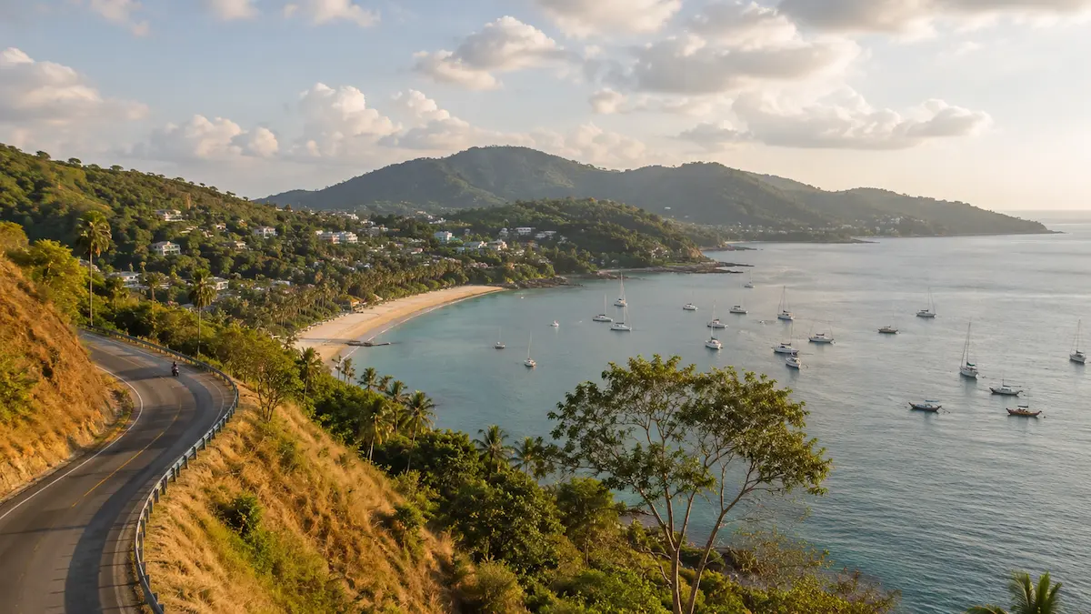 Scenic coastal road and bay near Nai Harn and Rawai in southern Phuket Thailand