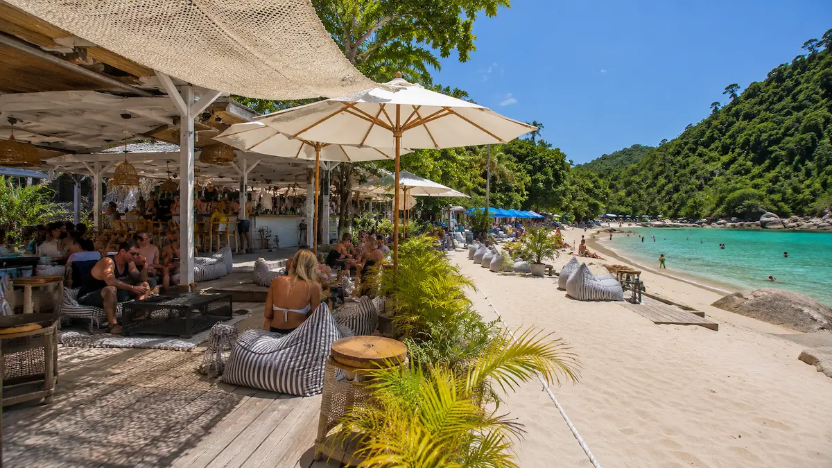 Beach club-style seating area at Paradise Beach Phuket