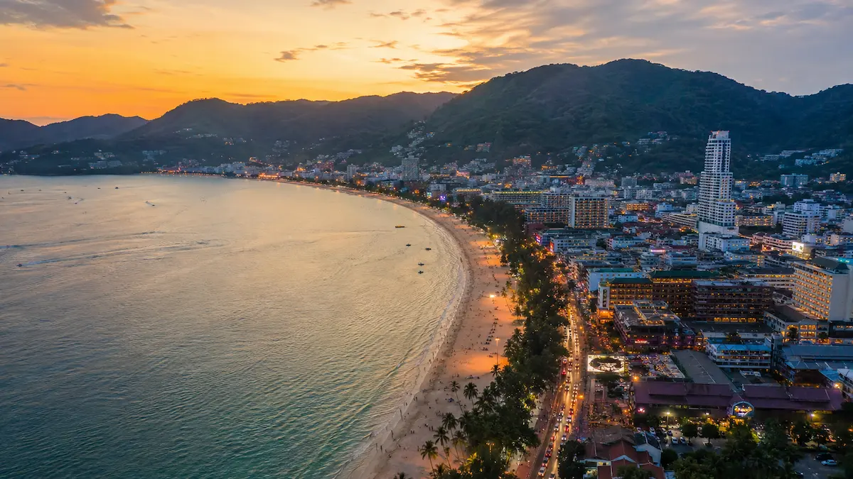 Aerial evening view of Patong Beach showing Phuket’s busiest tourist area and beachfront atmosphere