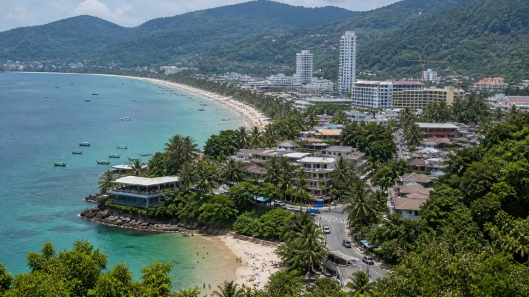 Phuket travel costs overview showing coastline, beaches, hotels, and town areas from an elevated view