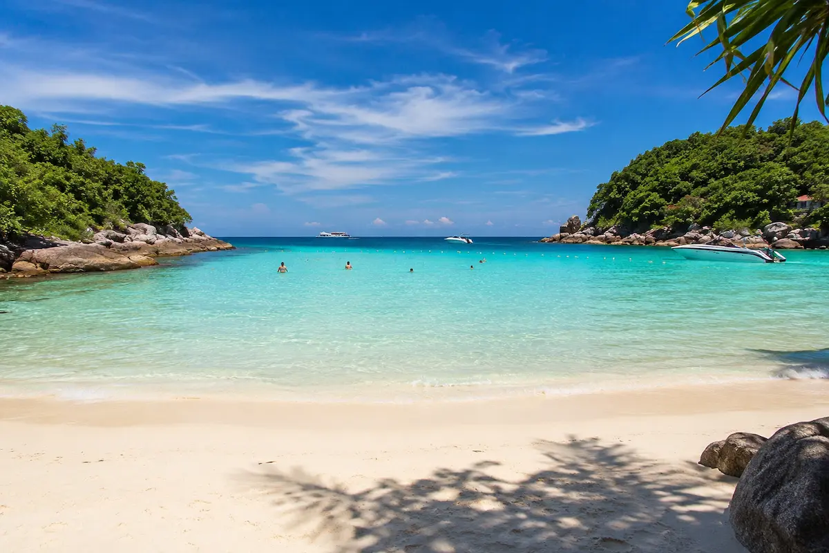 Clear turquoise water and white sand beach at Racha Island near Phuket Thailand