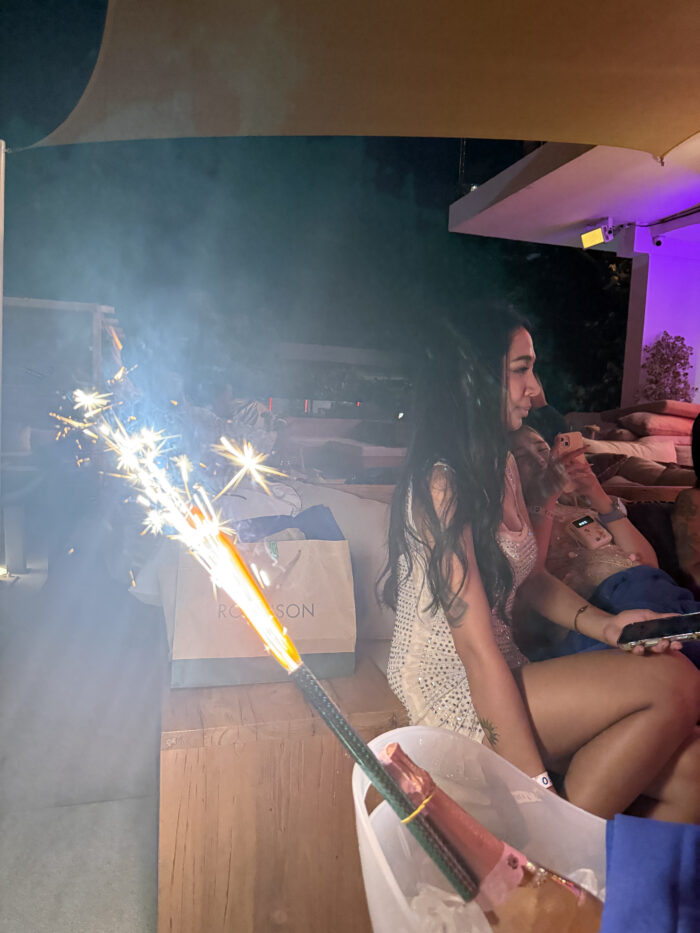 Birthday sparklers during a celebration at Fira Beach Club Phuket